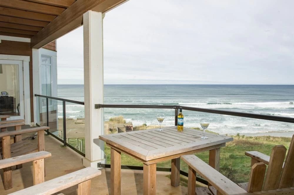 Michael's Beach Place @ Shoreline Ridge — Oceanfront deck with dining table