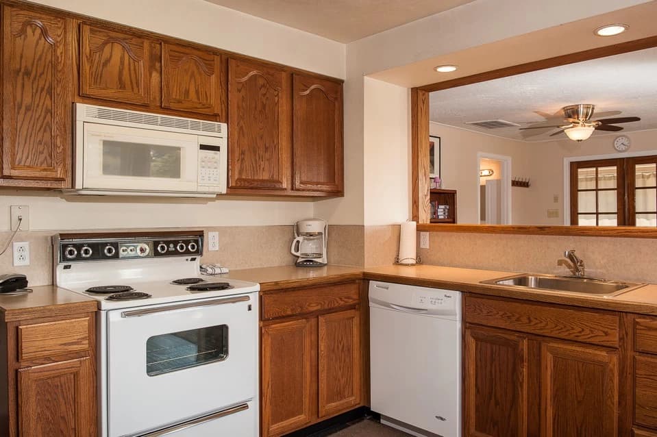 Kitchen with wood cabinets
