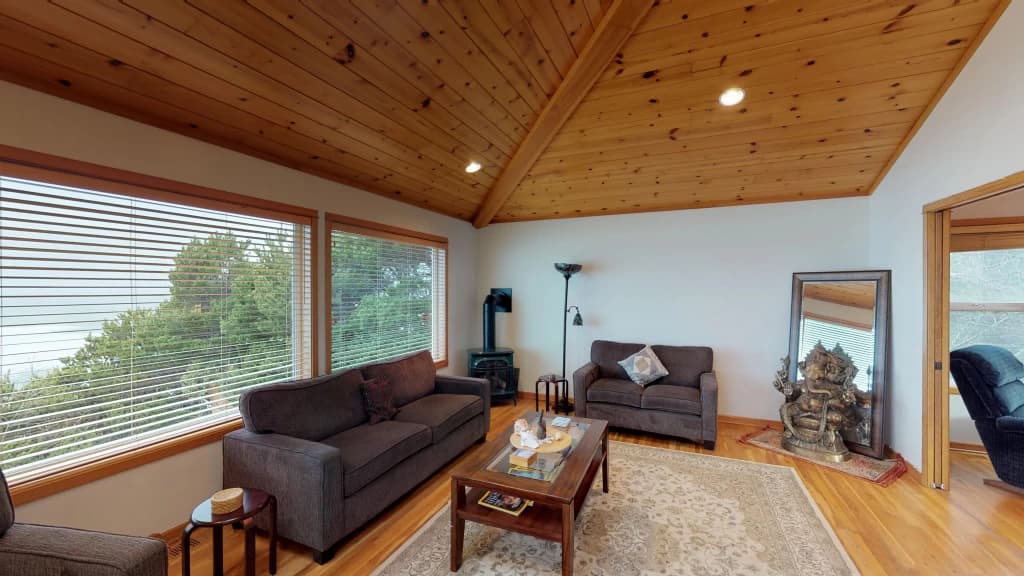 Living room with forest views