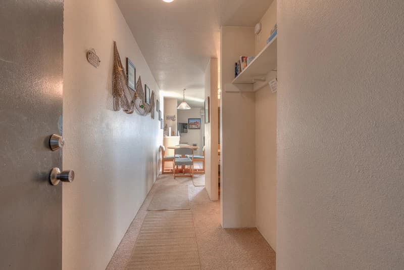 Hallway with entryway storage