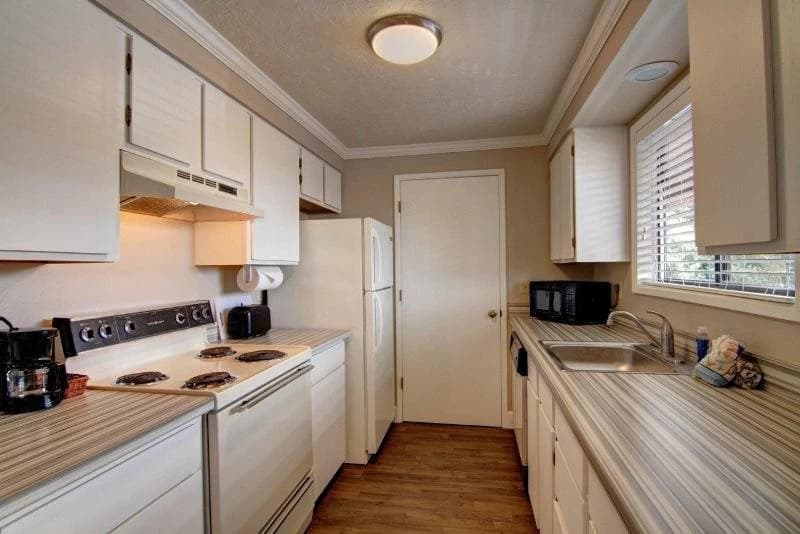 Galley kitchen with appliances