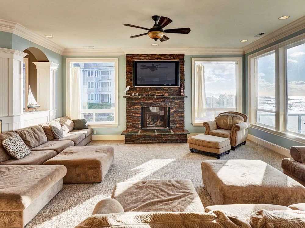 Ocean-view living room with fireplace