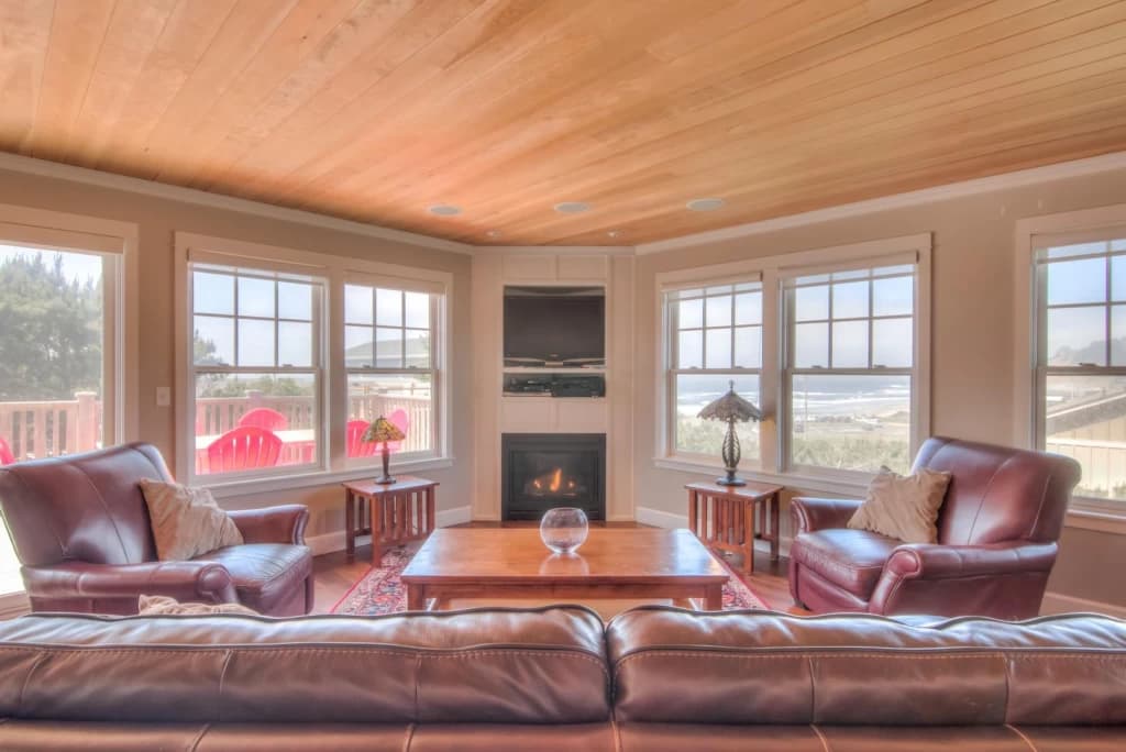 Ocean-view living room with fireplace