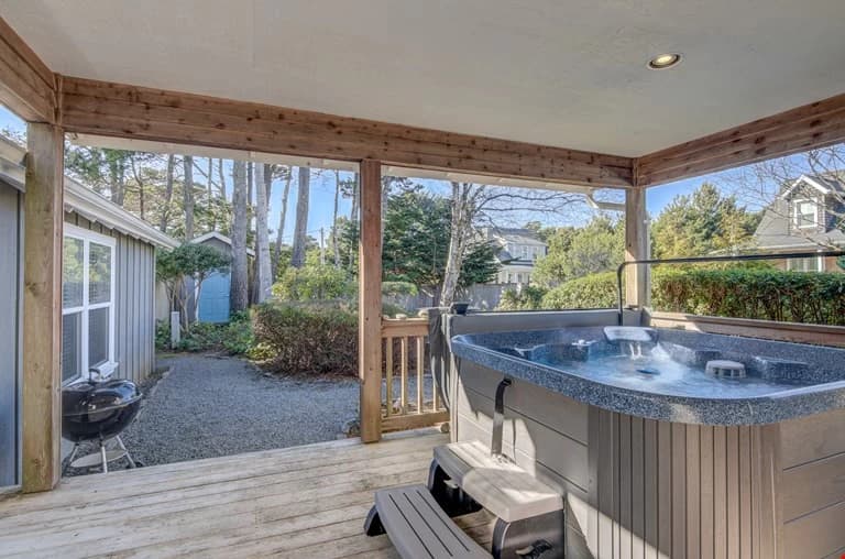 Covered deck with hot tub