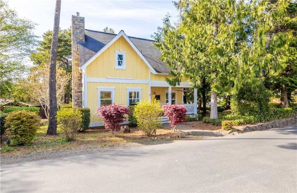 Charming yellow cottage exterior