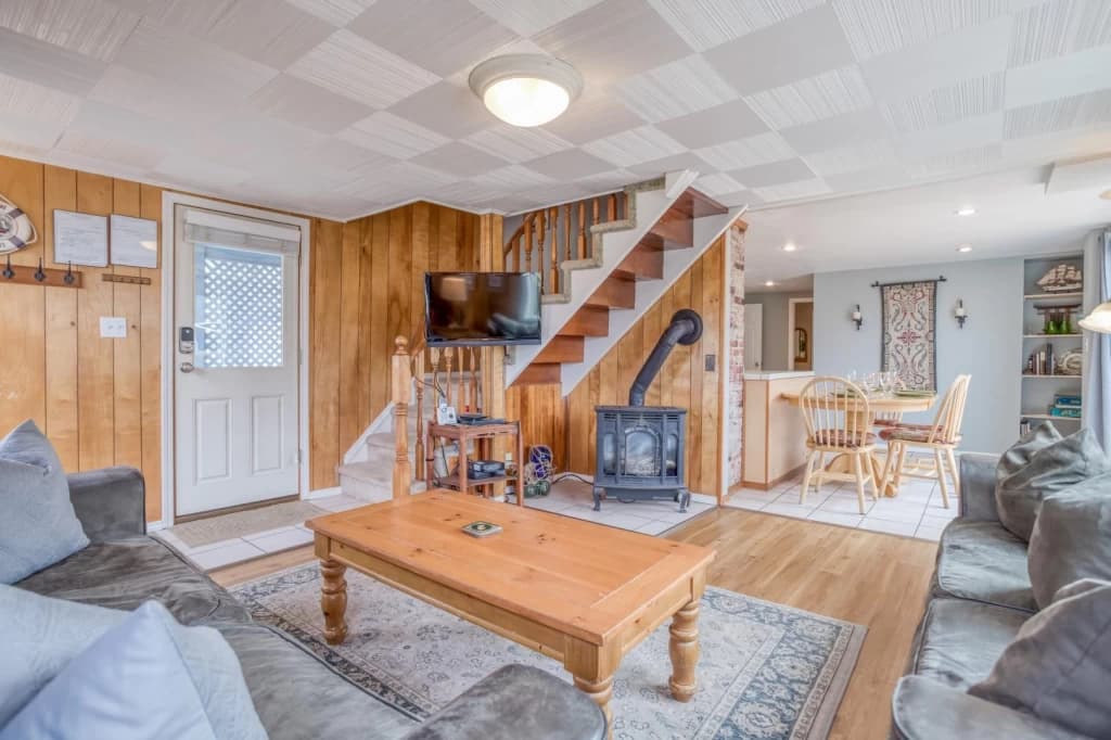 Open-concept living room with stove