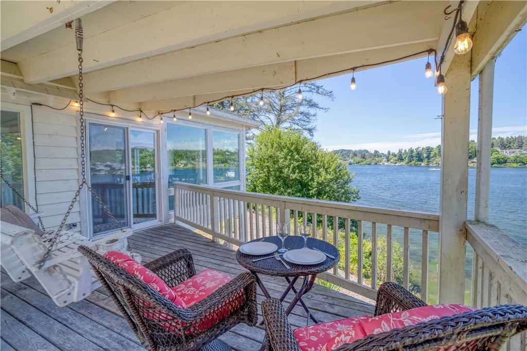 Waterfront deck with covered patio