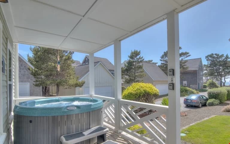 Covered deck with hot tub