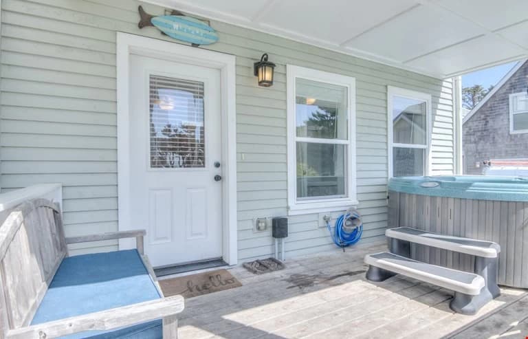 Coastal patio with hot tub