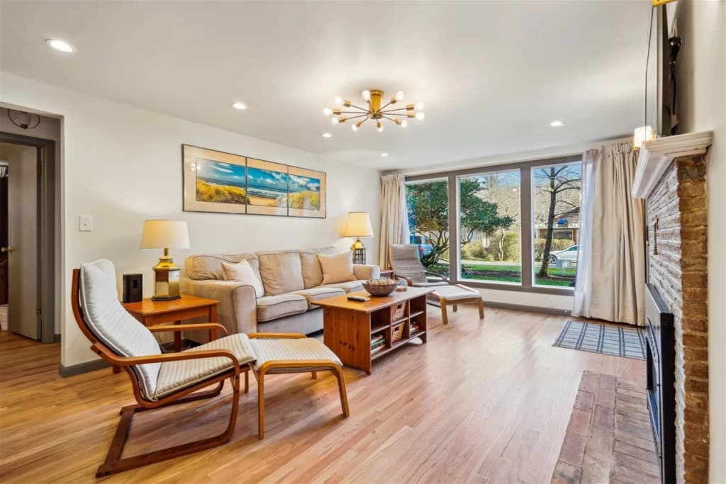 Spacious living room with garden views