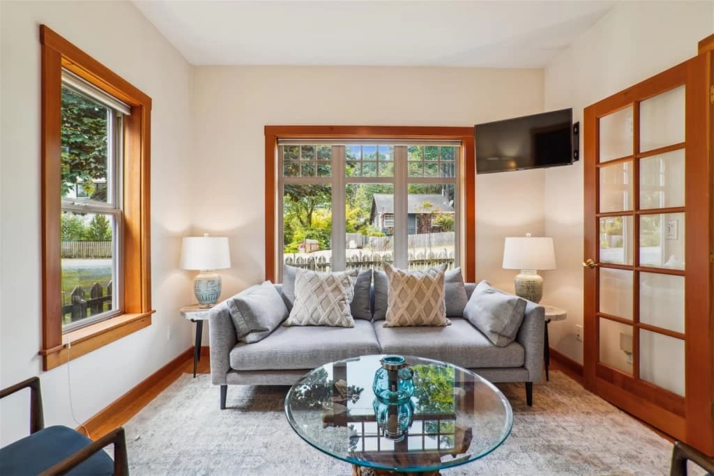 Sunlit living room with garden views