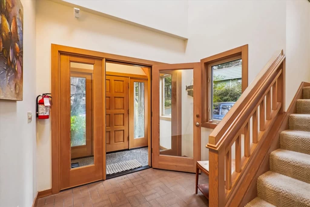 Foyer with wooden doors