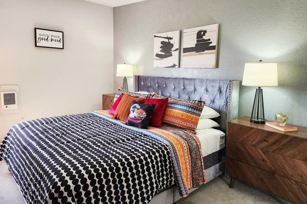 Master bedroom with gray headboard