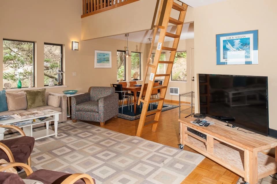 Open-concept living room with loft