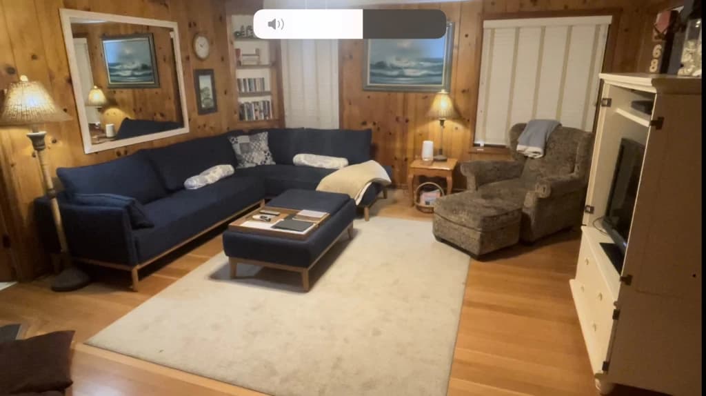 Cozy wood-paneled living room
